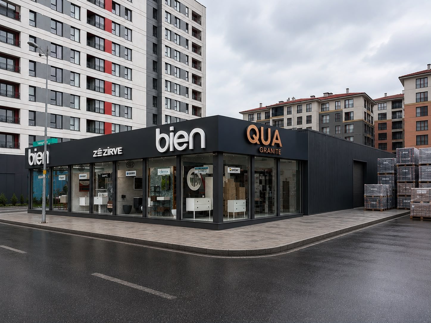Zirve İnşaat showroom binasının dış görünümü, Bien ve QUA Granite tabelalı sergi mağazası